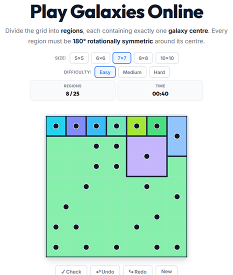 Galaxies Tentai Show puzzle played online — divide the grid into rotationally symmetric regions